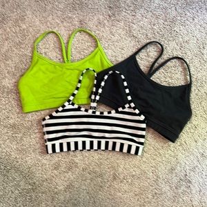 Three lululemon Flow Y bras
